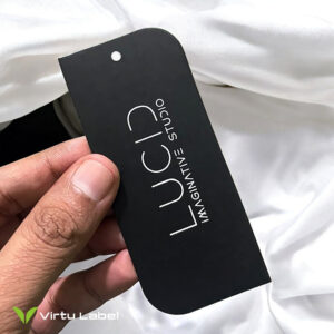 Black Hang tag on White fabric background