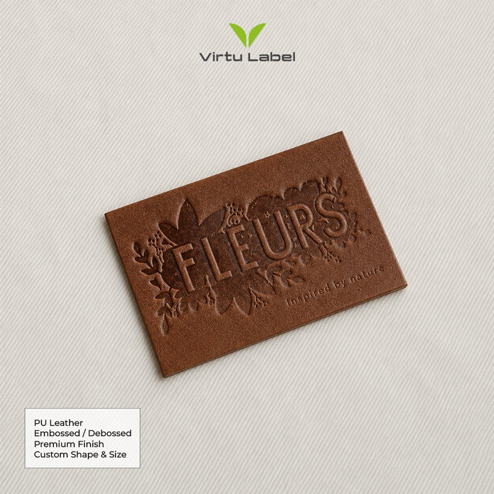 Brown PU leather patch with embossed floral logo and custom lettering