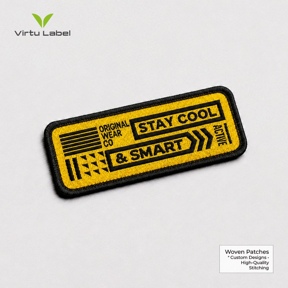 Premium yellow embroidered patch with black border and geometric “STAY COOL & SMART” design